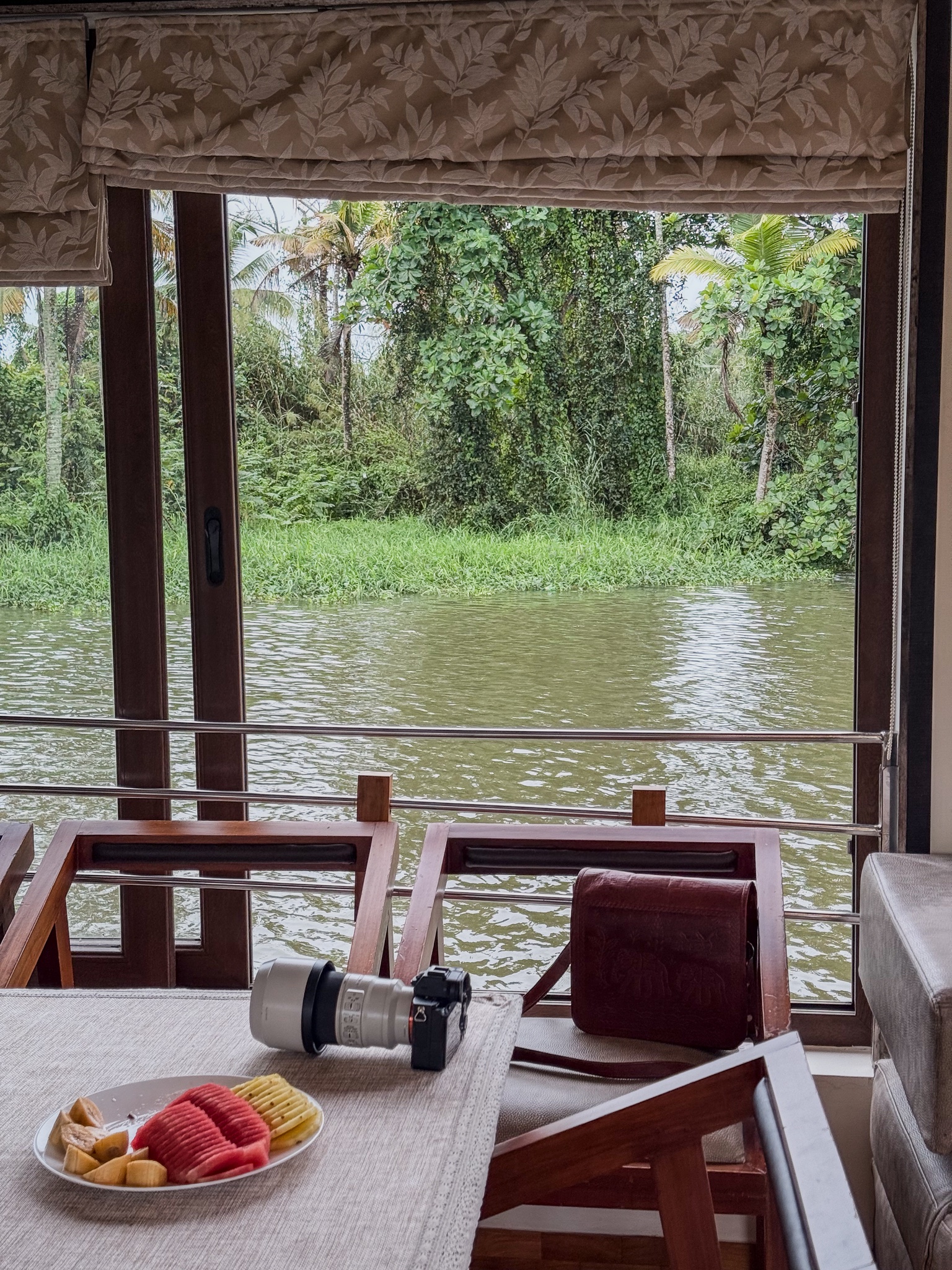 A morning on the backwaters — gear drying out and fruit by the open window.