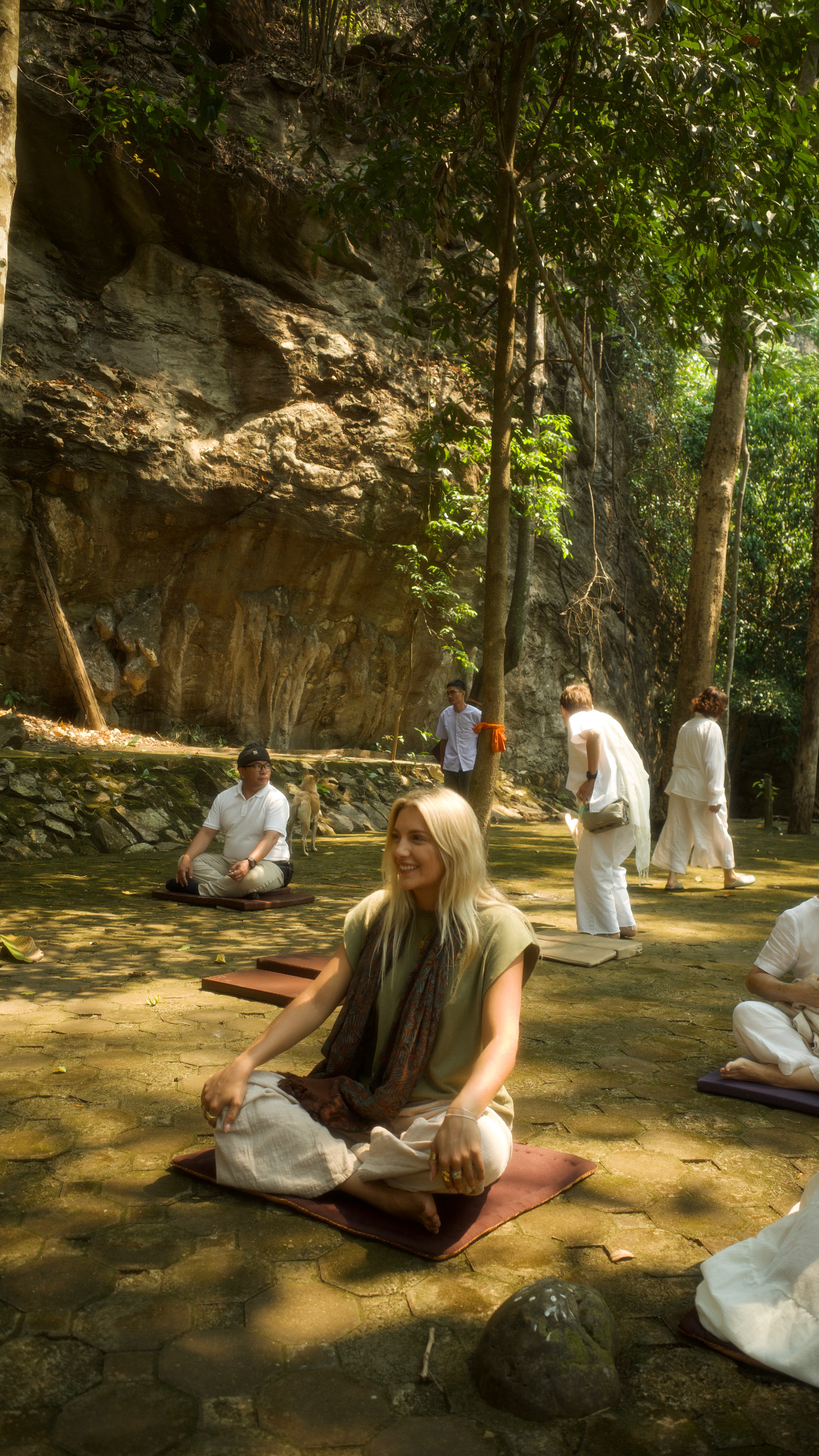 Sitting in on a walking-meditation session beneath the limestone cliffs.