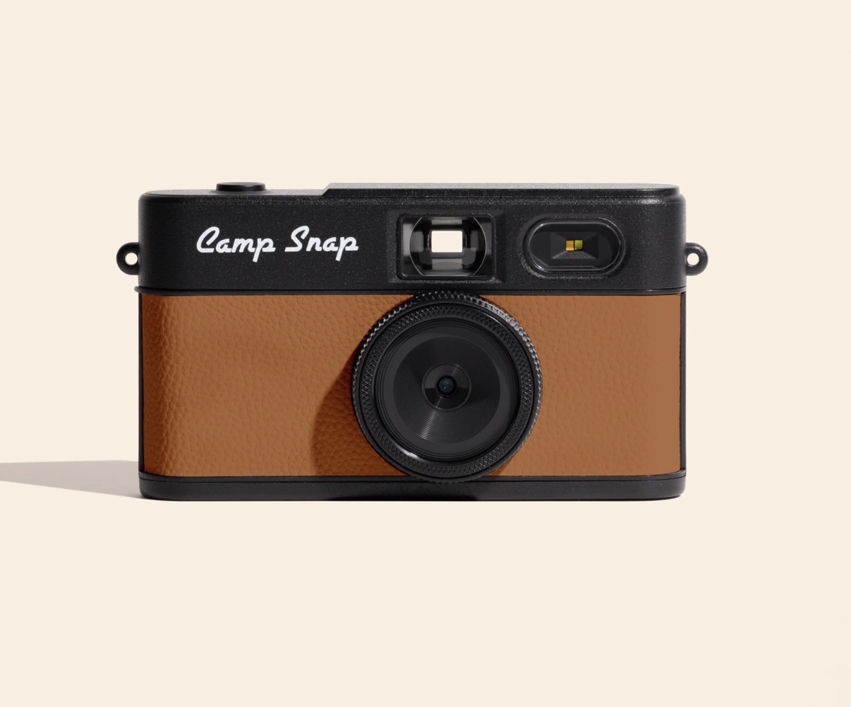Camp Snap camera with a black top and brown leather body